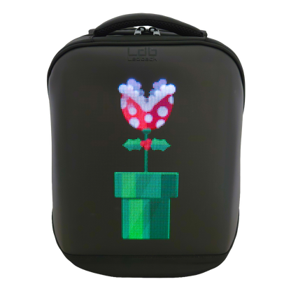 Black Ldb Ledback HD Smart LED Laptop Backpack with the LED screen showing a picture of the red and white piranha plant from Mario Bros popping up of a green pipe, viewed from the front isolated on a transparent background.